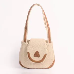 A chic handmade sling bag with a zip and a button pocket. Easily holds phone, charger, wallet, and make up.  Colour: Multicoloured