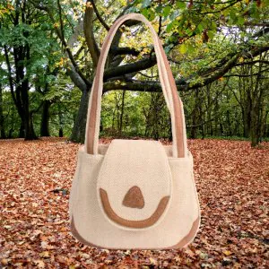 A chic handmade sling bag with a zip and a button pocket. Easily holds phone, charger, wallet, and make up.  Colour: Multicoloured